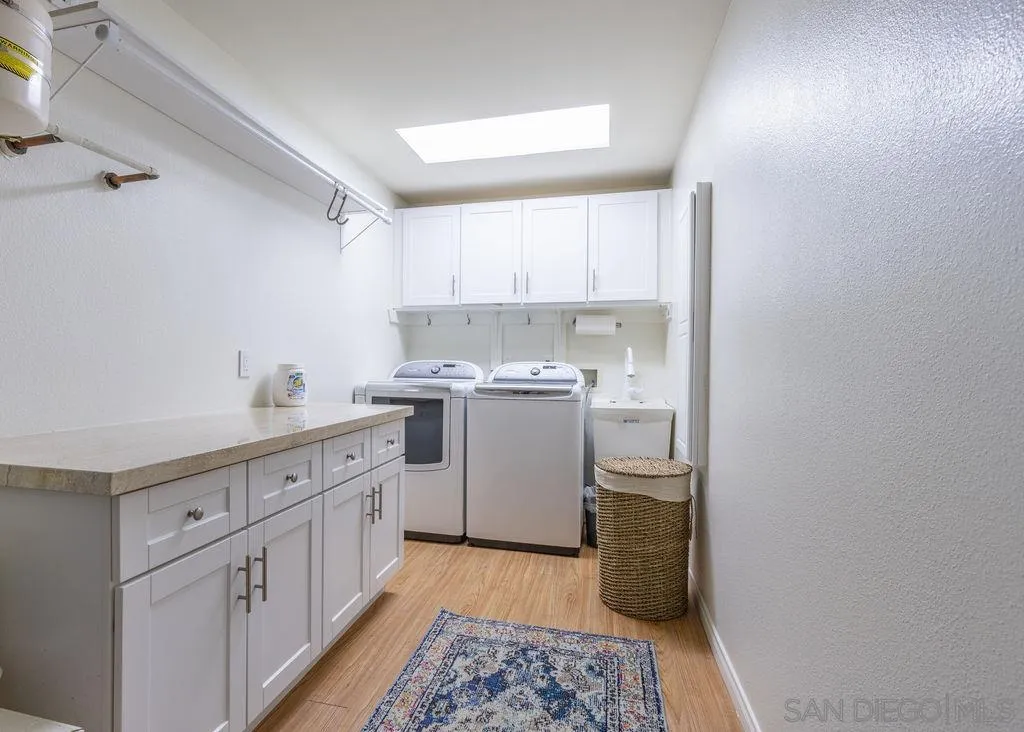 2508 Manchester Avenue Cardiff, CA 92007 - Photo 67 of 75 a kitchen with a sink a stove top oven and cabinets