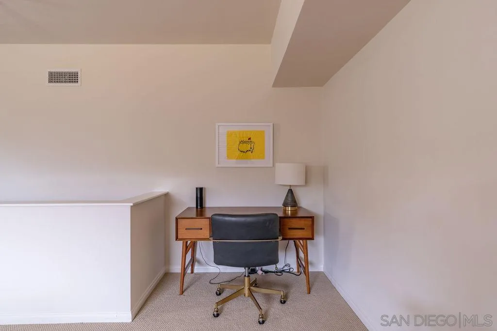 2508 Manchester Avenue Cardiff, CA 92007 - Photo 70 of 75 a workspace with furniture and a window