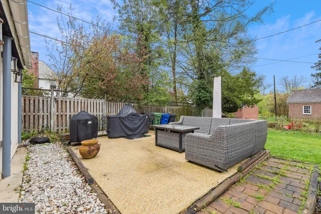 a view of a couches and deck in the backyard