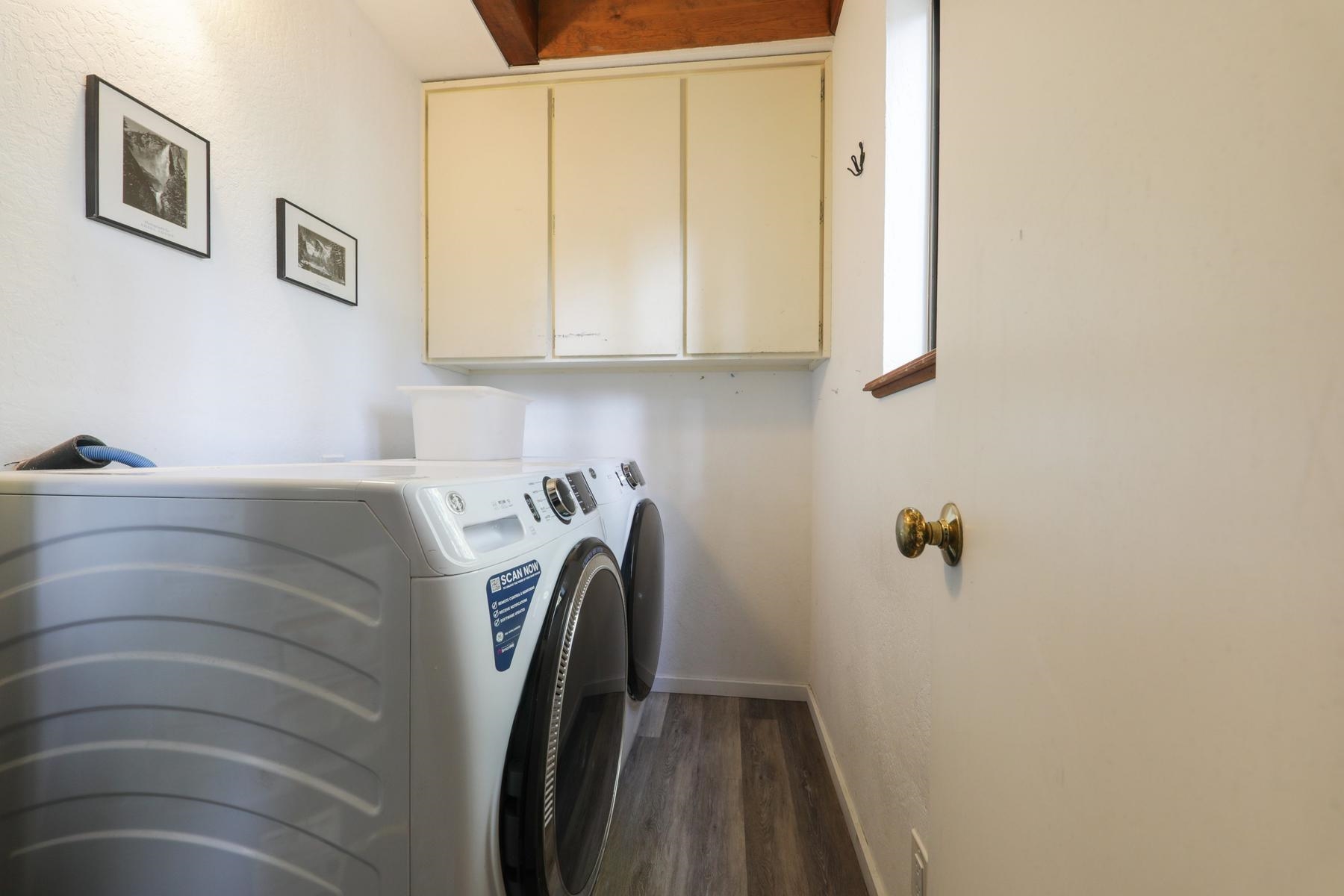 5656 Victoria Road Carnelian Bay, CA 96140 - Photo 24 of 28 a utility room with dryer and washer