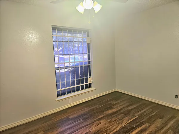 a view of an empty room with stairs