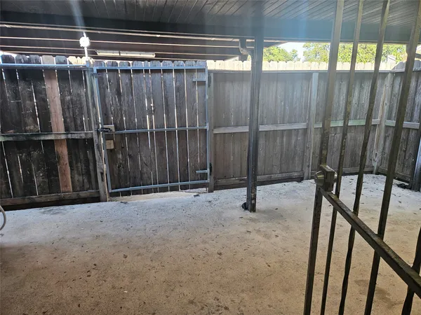 a view of a backyard of the house