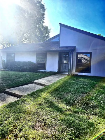 a view of a livingroom with wooden floor