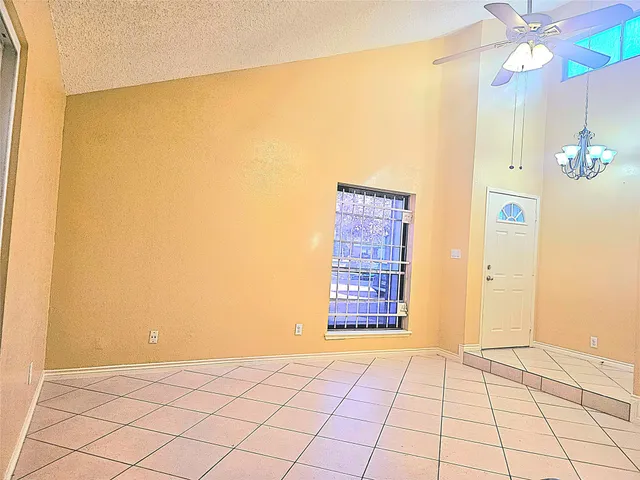 a kitchen with stainless steel appliances a refrigerator sink and cabinets