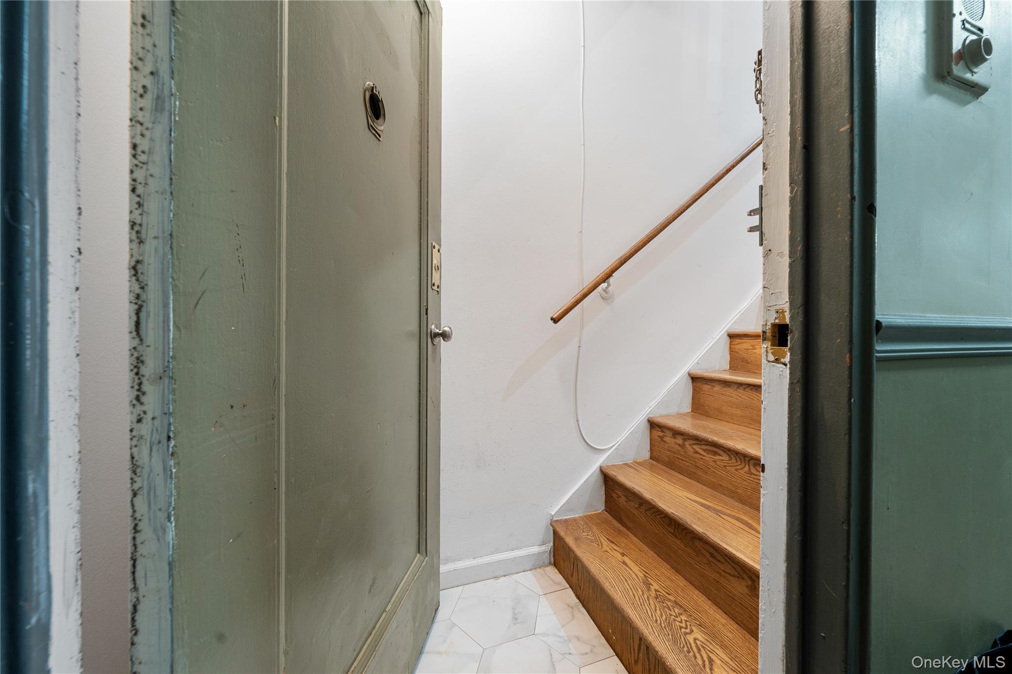 99-32 66th Road, Unit 5K Queens, NY 11374 - Photo 7 of 20 Stairs featuring marble finish floors