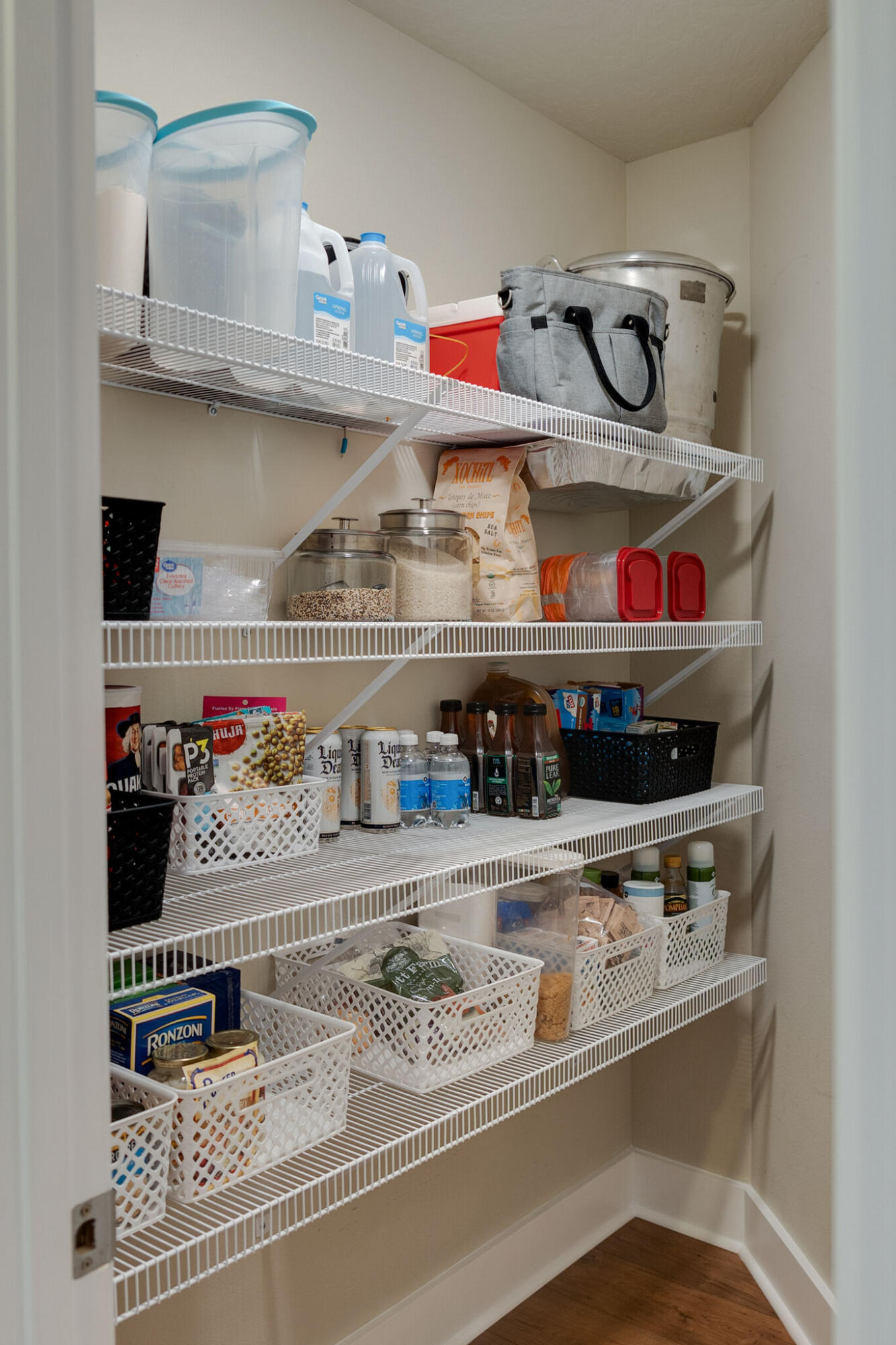 4723 Chanson Crossing Crestview, FL 32539 - Photo 21 of 58 a shelf with stainless steel appliances and cabinets