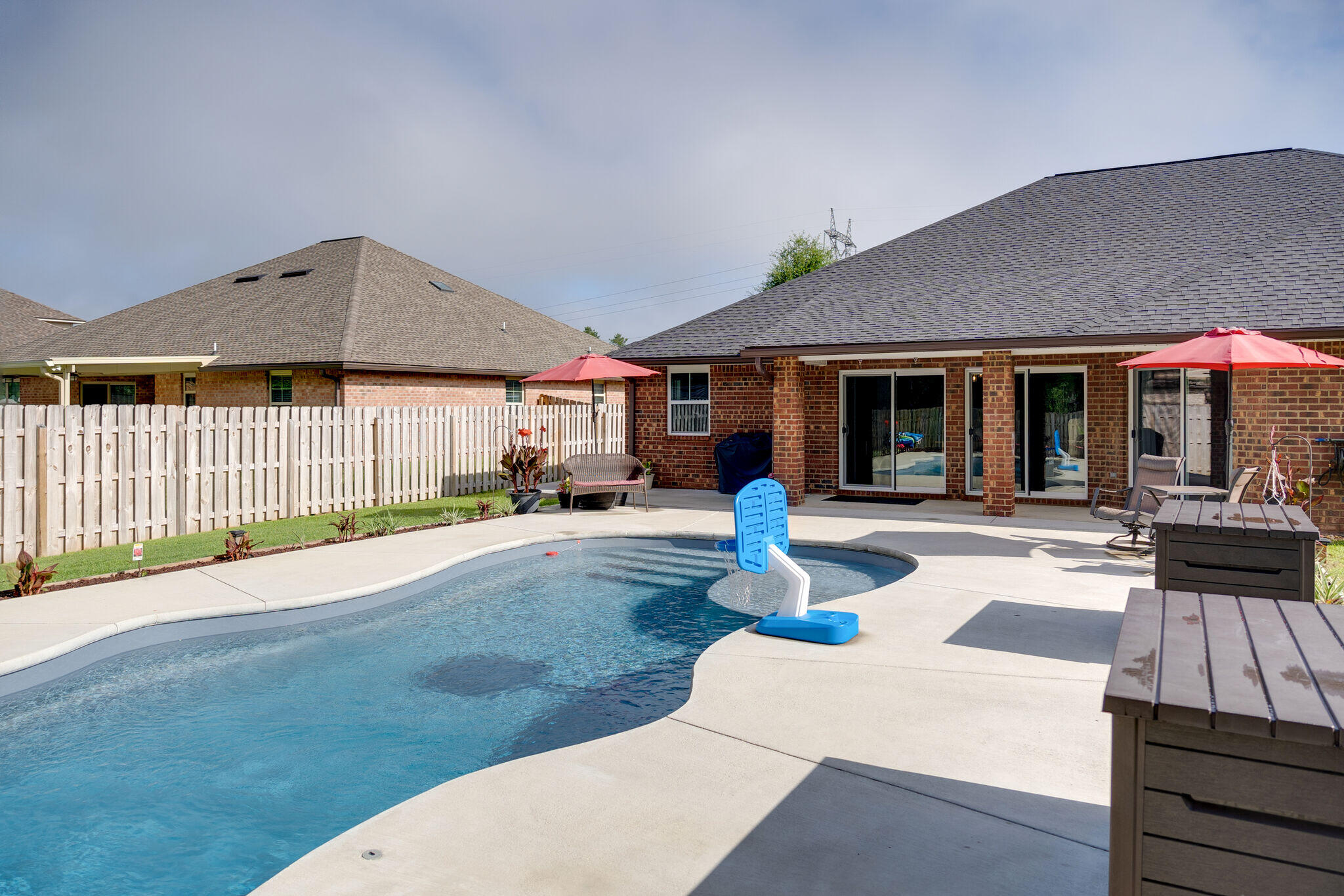 4723 Chanson Crossing Crestview, FL 32539 - Photo 49 of 58 a swimming pool view with a outdoor seating