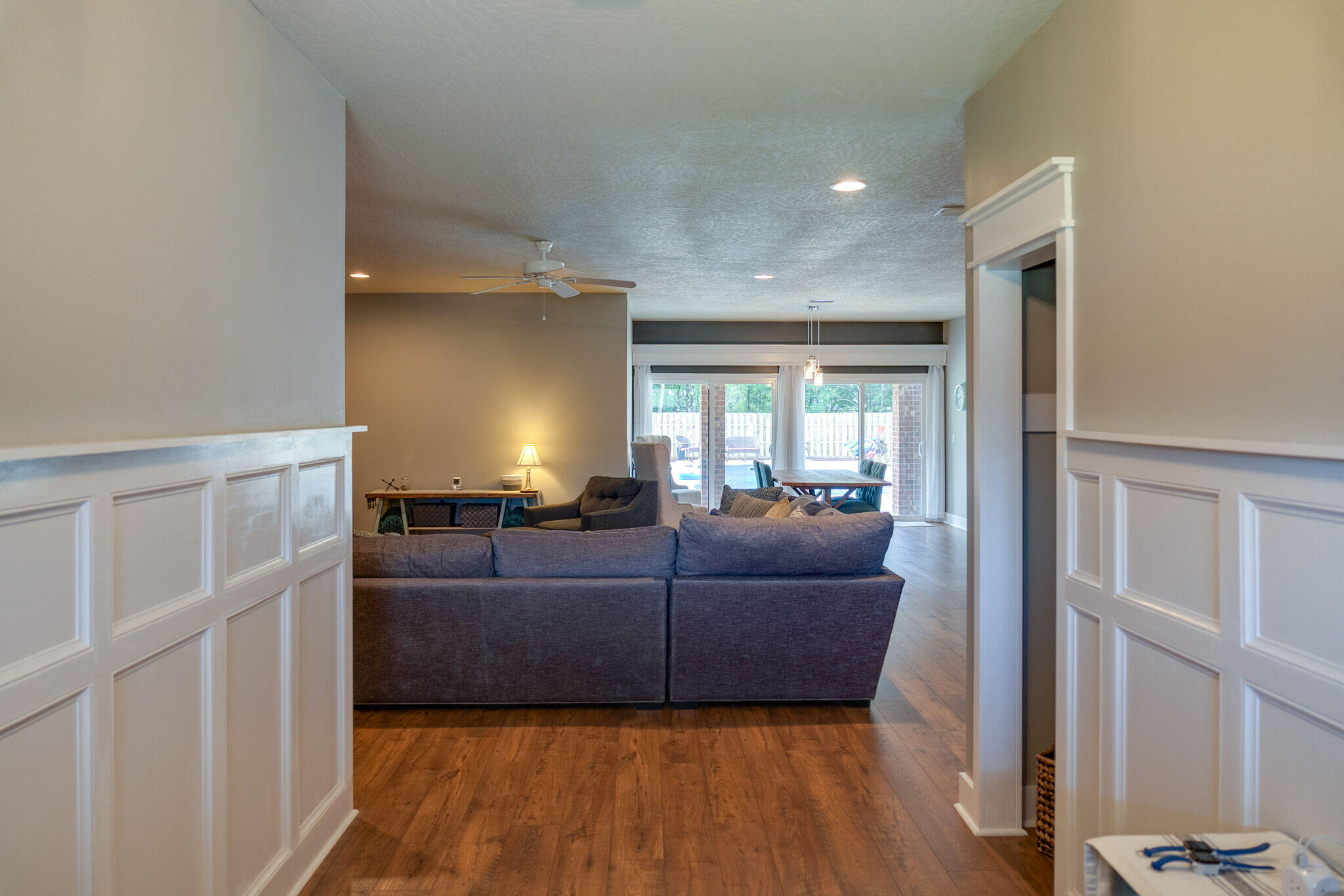 4723 Chanson Crossing Crestview, FL 32539 - Photo 8 of 58 a living room with furniture and a window