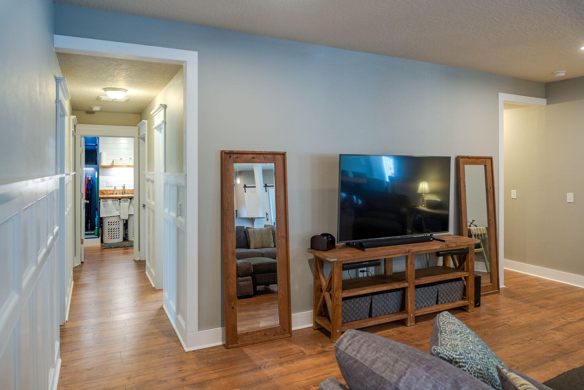 4723 Chanson Crossing Crestview, FL 32539 - Photo 9 of 58 a living room with furniture and a flat screen tv