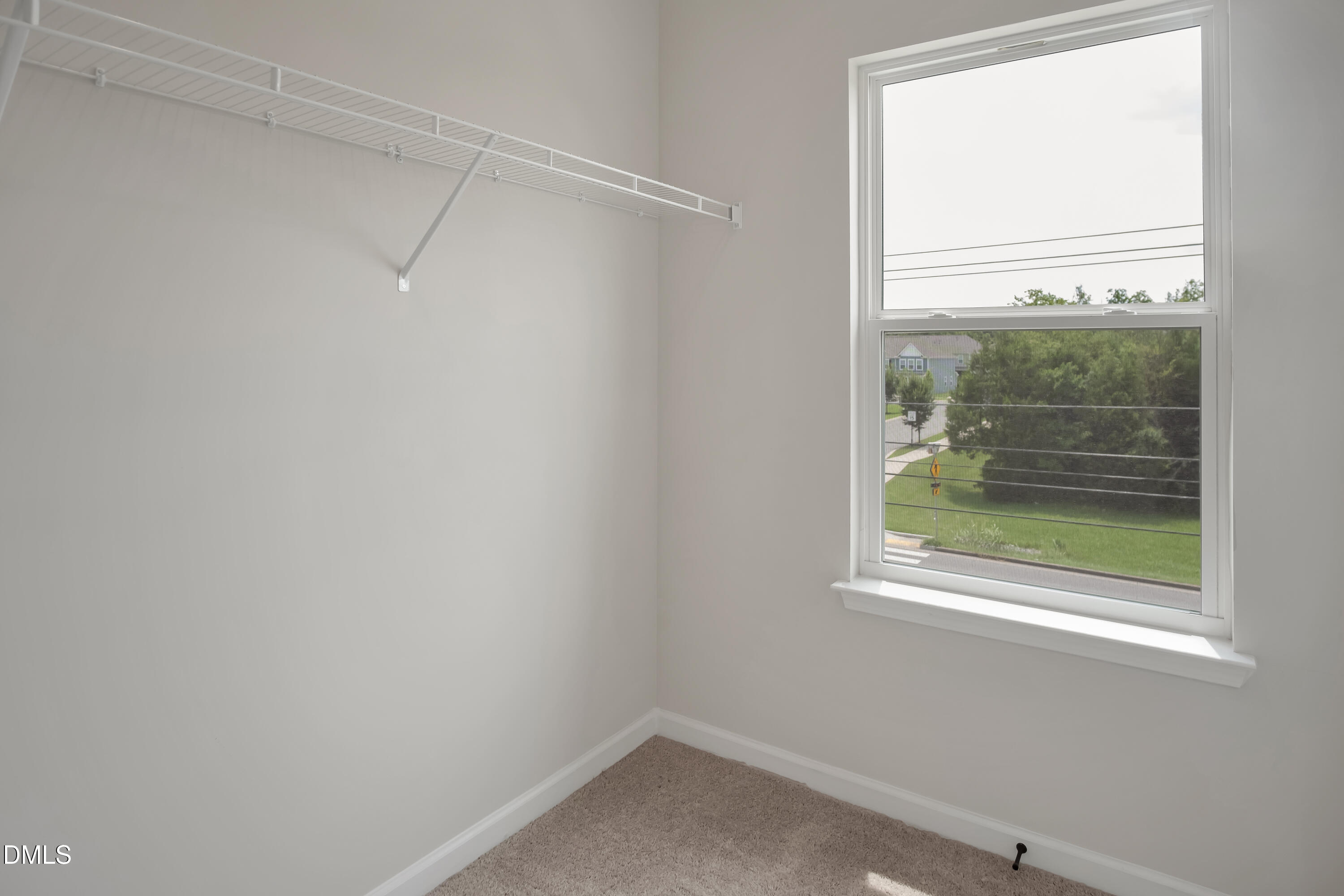 722 Orch Vista Circle Raleigh, NC 27606 - Photo 12 of 30 a view of a small space with wooden floor and a window