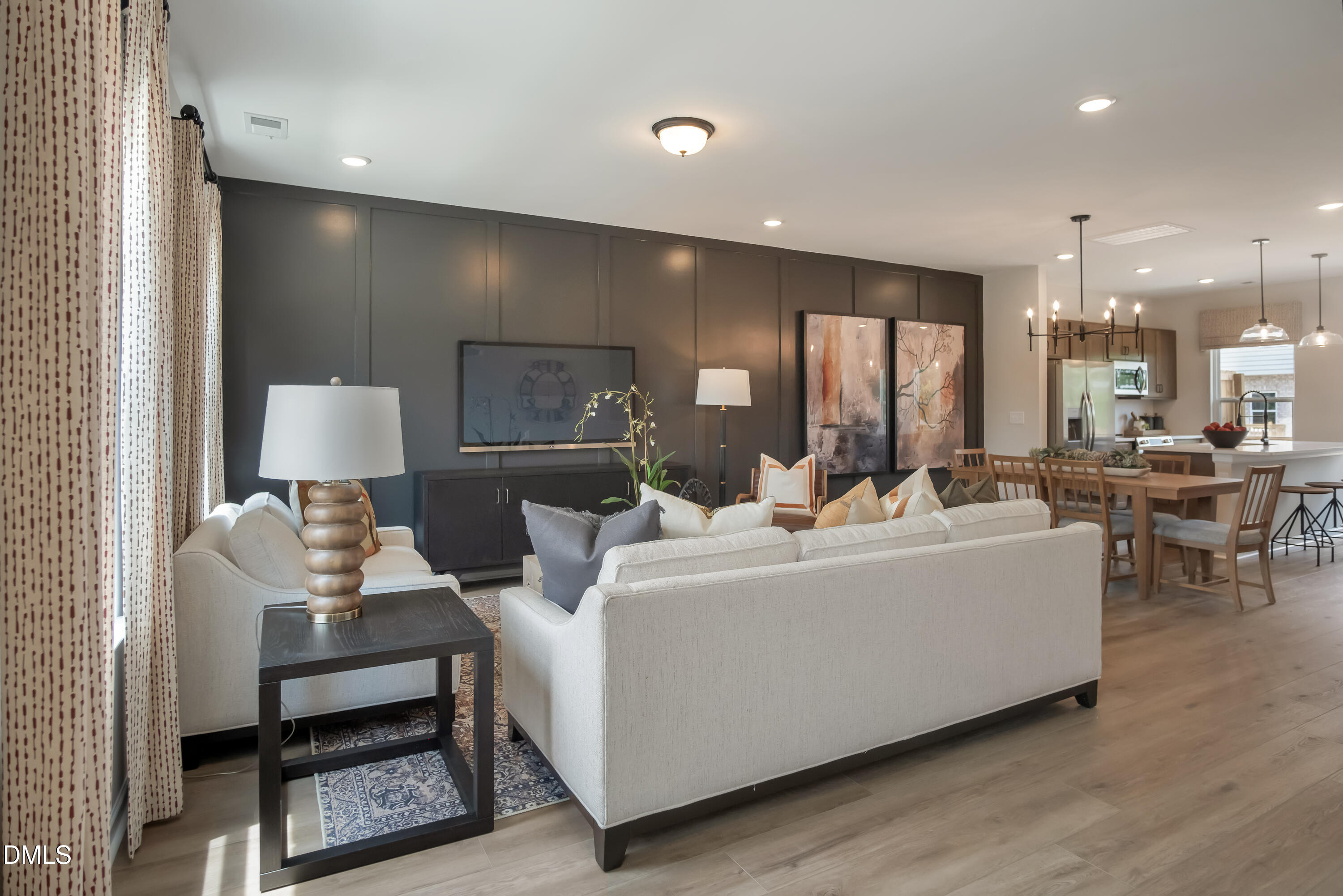 722 Orch Vista Circle Raleigh, NC 27606 - Photo 15 of 30 a living room with furniture and a wooden floor