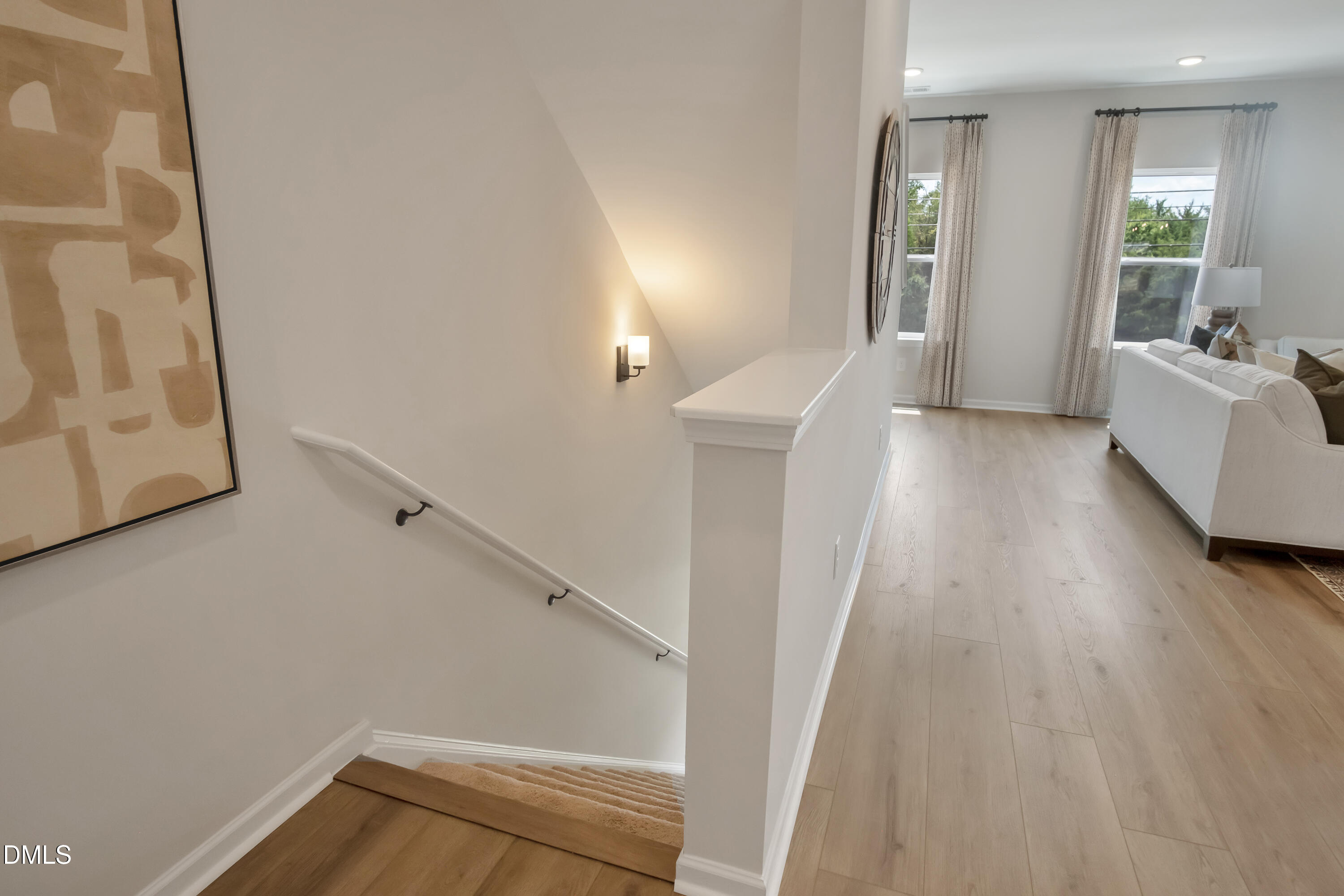 722 Orch Vista Circle Raleigh, NC 27606 - Photo 23 of 30 a view of hallway with furniture and wooden floor