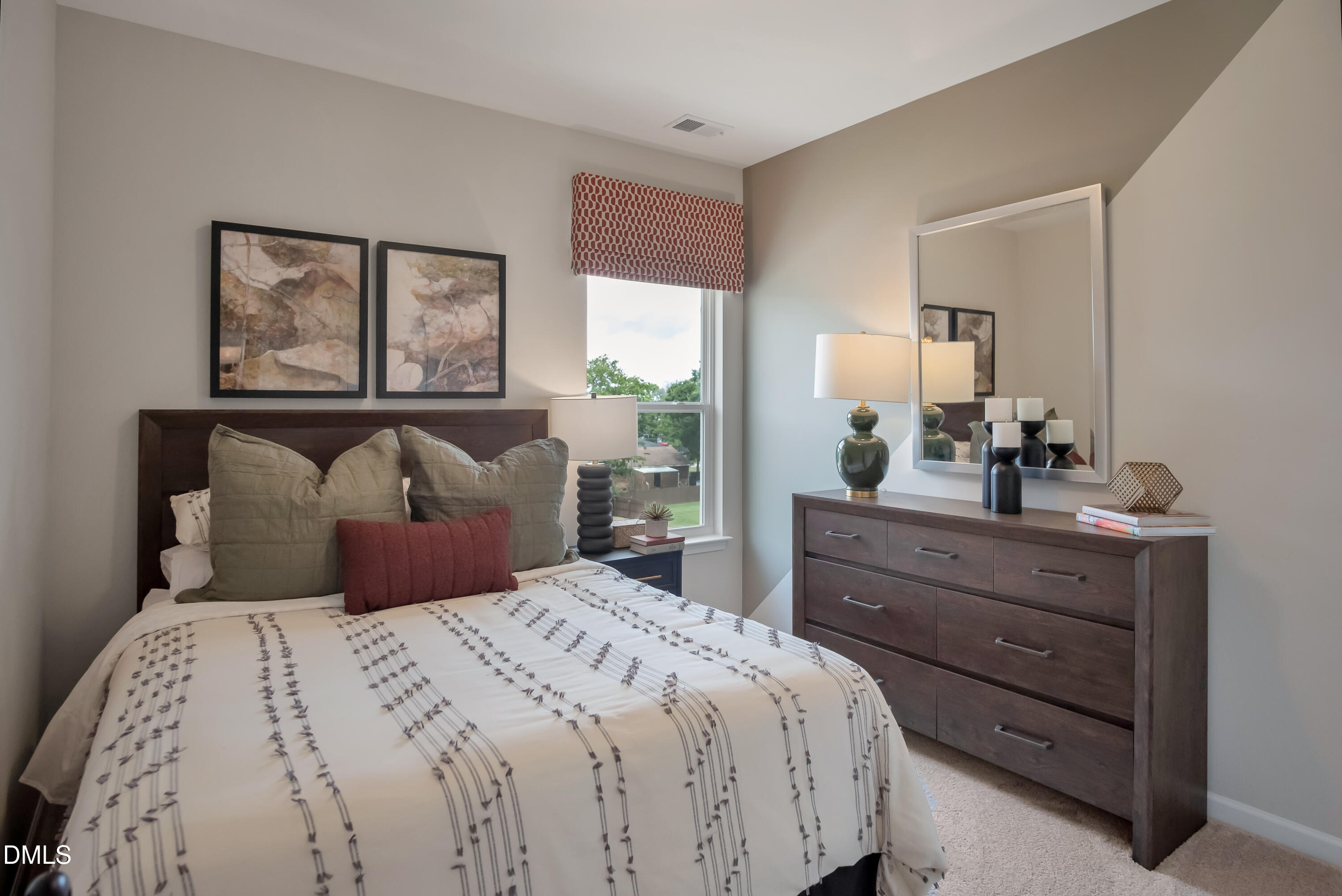 722 Orch Vista Circle Raleigh, NC 27606 - Photo 3 of 30 a bedroom with a large bed and a large window