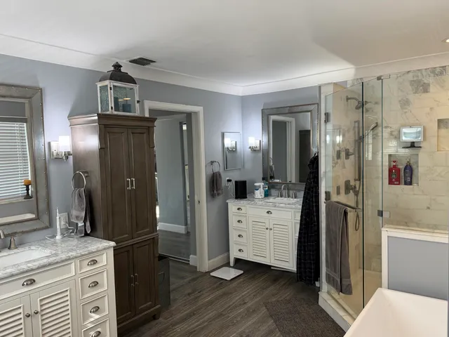 a kitchen with a refrigerator and sink
