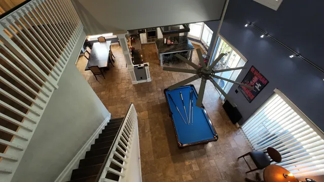 a view of a hallway view with staircase