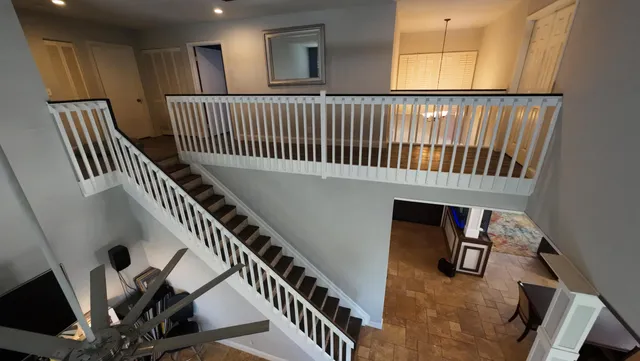 a room with furniture and a flat screen tv