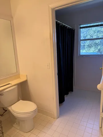 a bathroom with a toilet