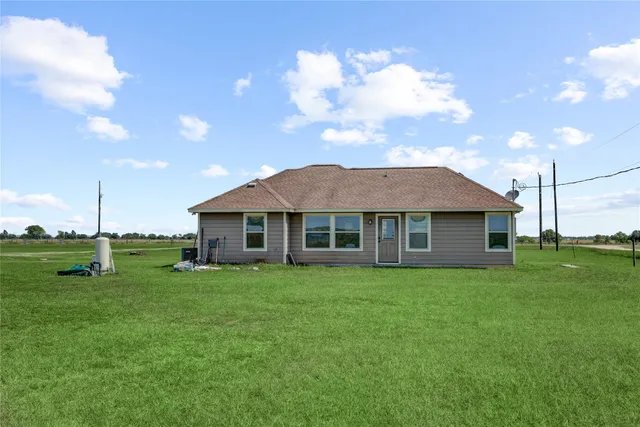 a view of yard with an outdoor seating
