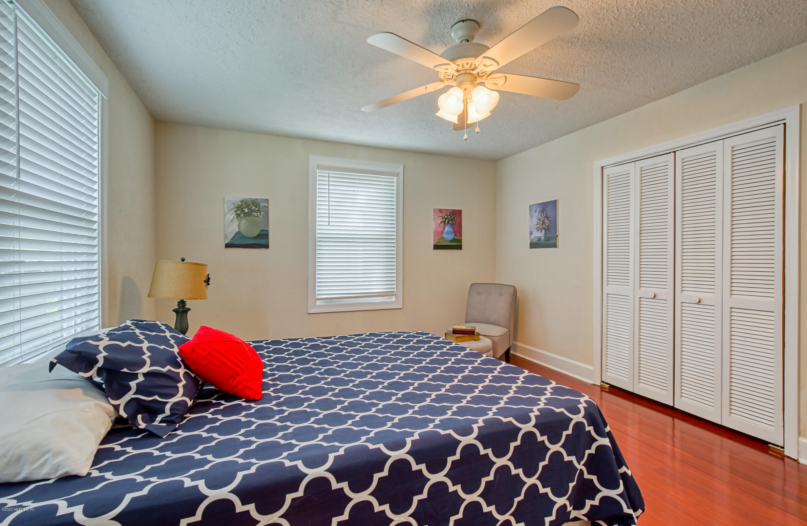 4615 Birkenhead Road Jacksonville, FL 32210 - Photo 24 of 45 a bedroom with a bed and a window