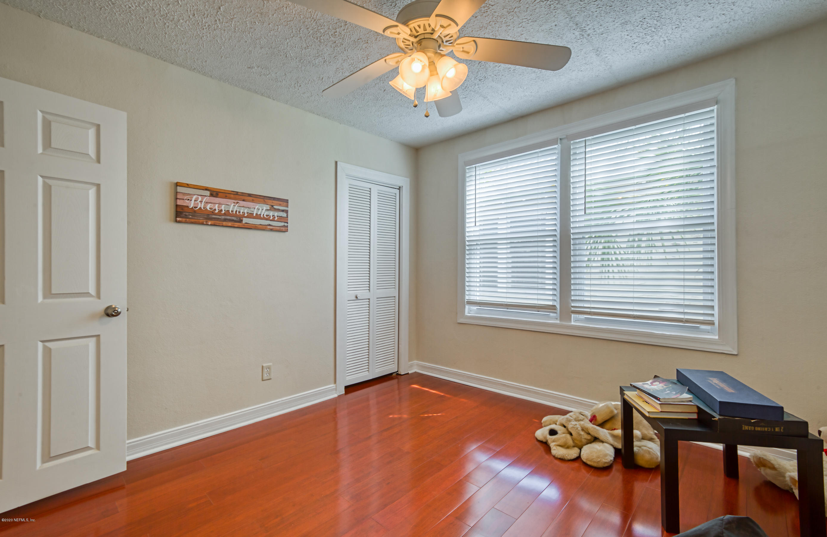 4615 Birkenhead Road Jacksonville, FL 32210 - Photo 33 of 45 a view of a livingroom with furniture and window in the room