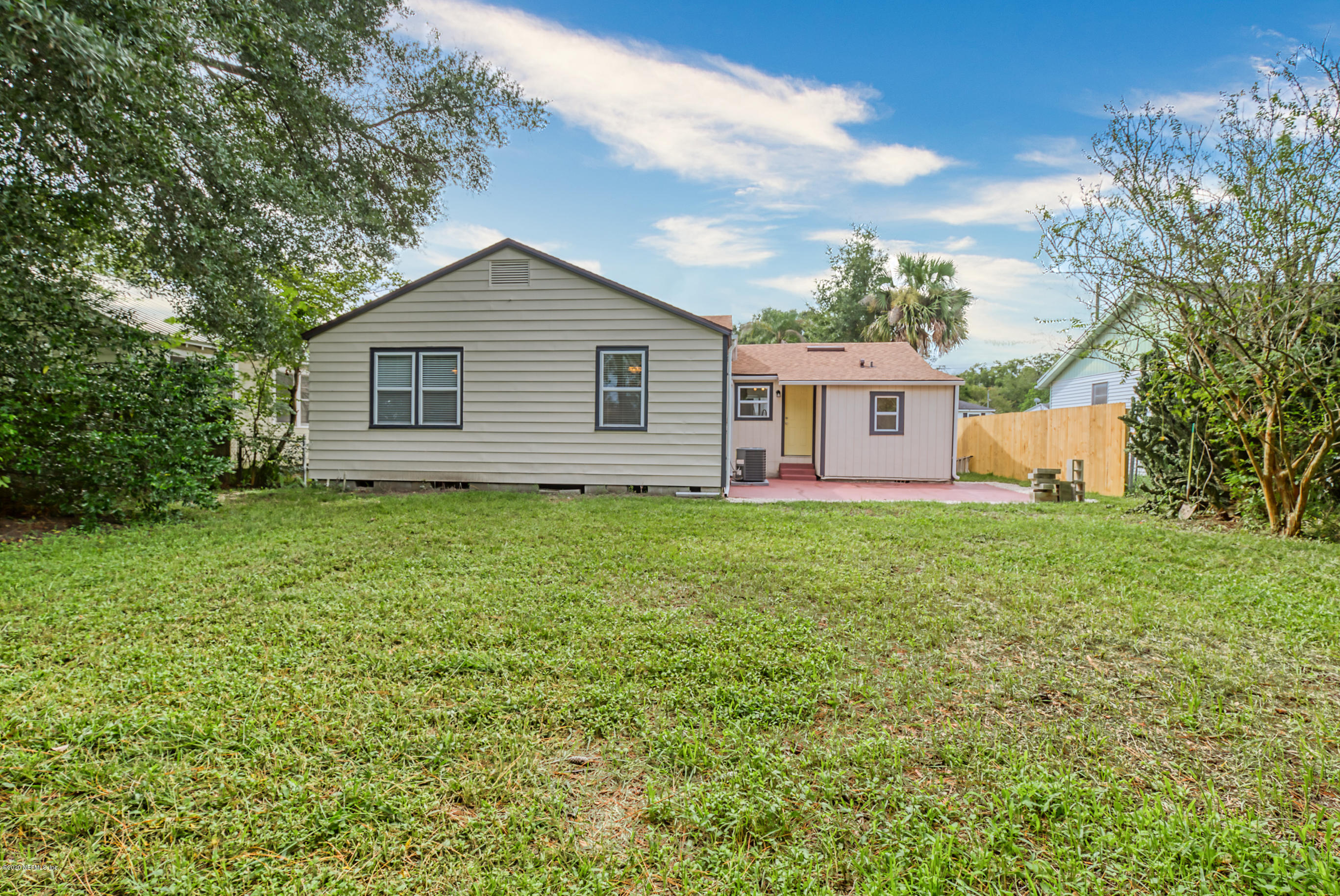 4615 Birkenhead Road Jacksonville, FL 32210 - Photo 36 of 45 a view of a house with yard and a garden