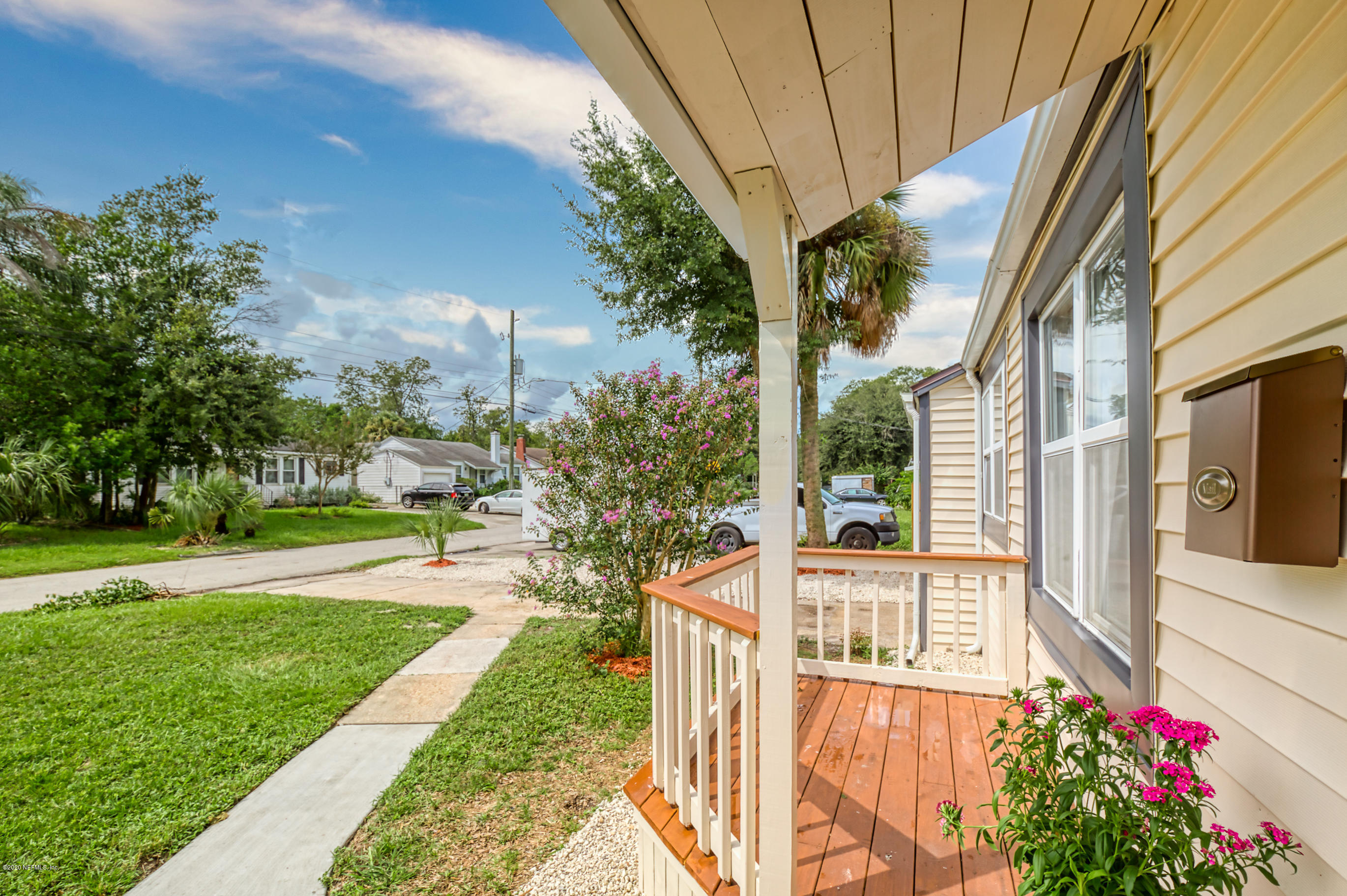 4615 Birkenhead Road Jacksonville, FL 32210 - Photo 45 of 45 a view of a house with a small yard and potted plants