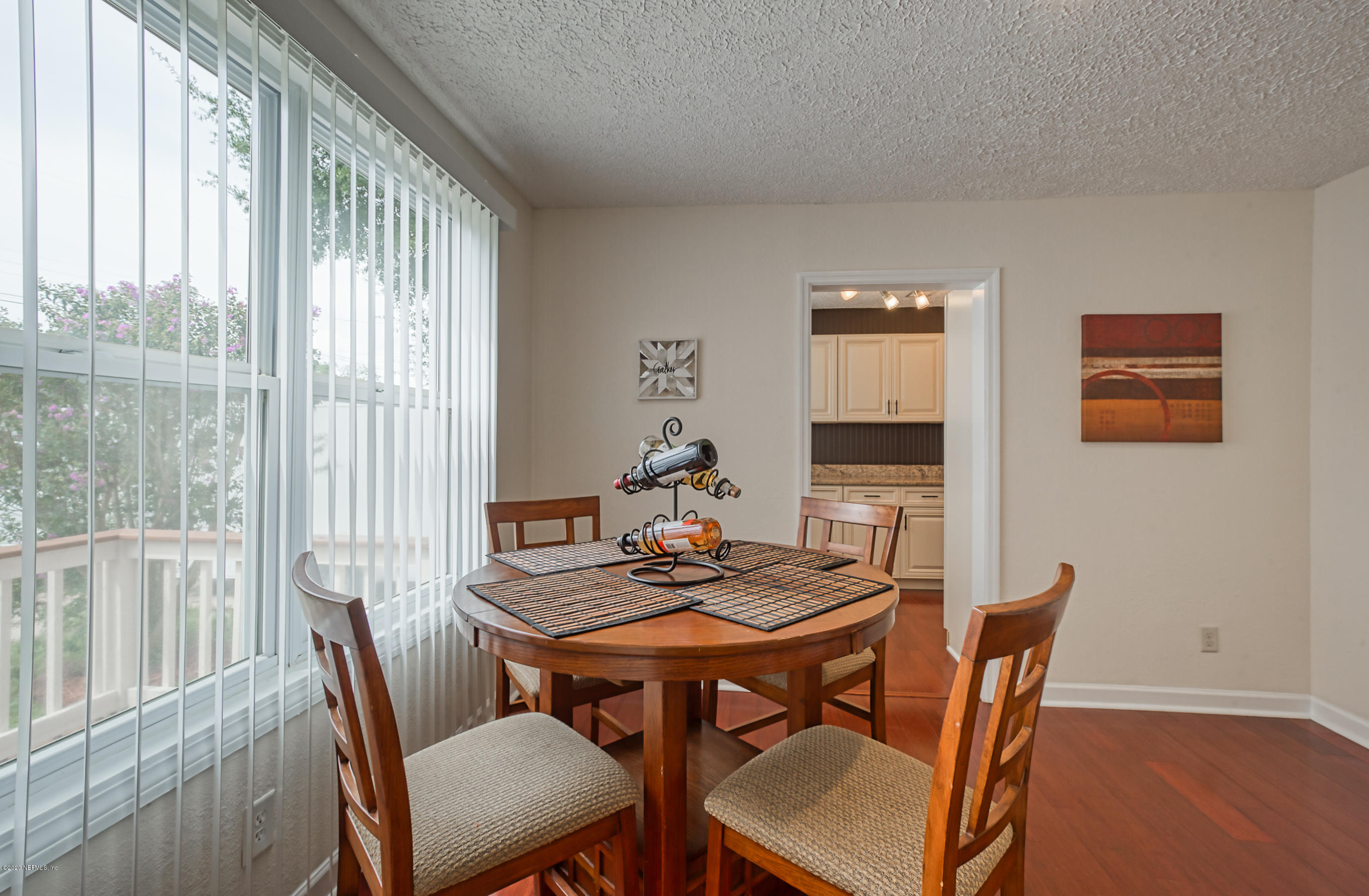 4615 Birkenhead Road Jacksonville, FL 32210 - Photo 7 of 45 a dining room with furniture and window