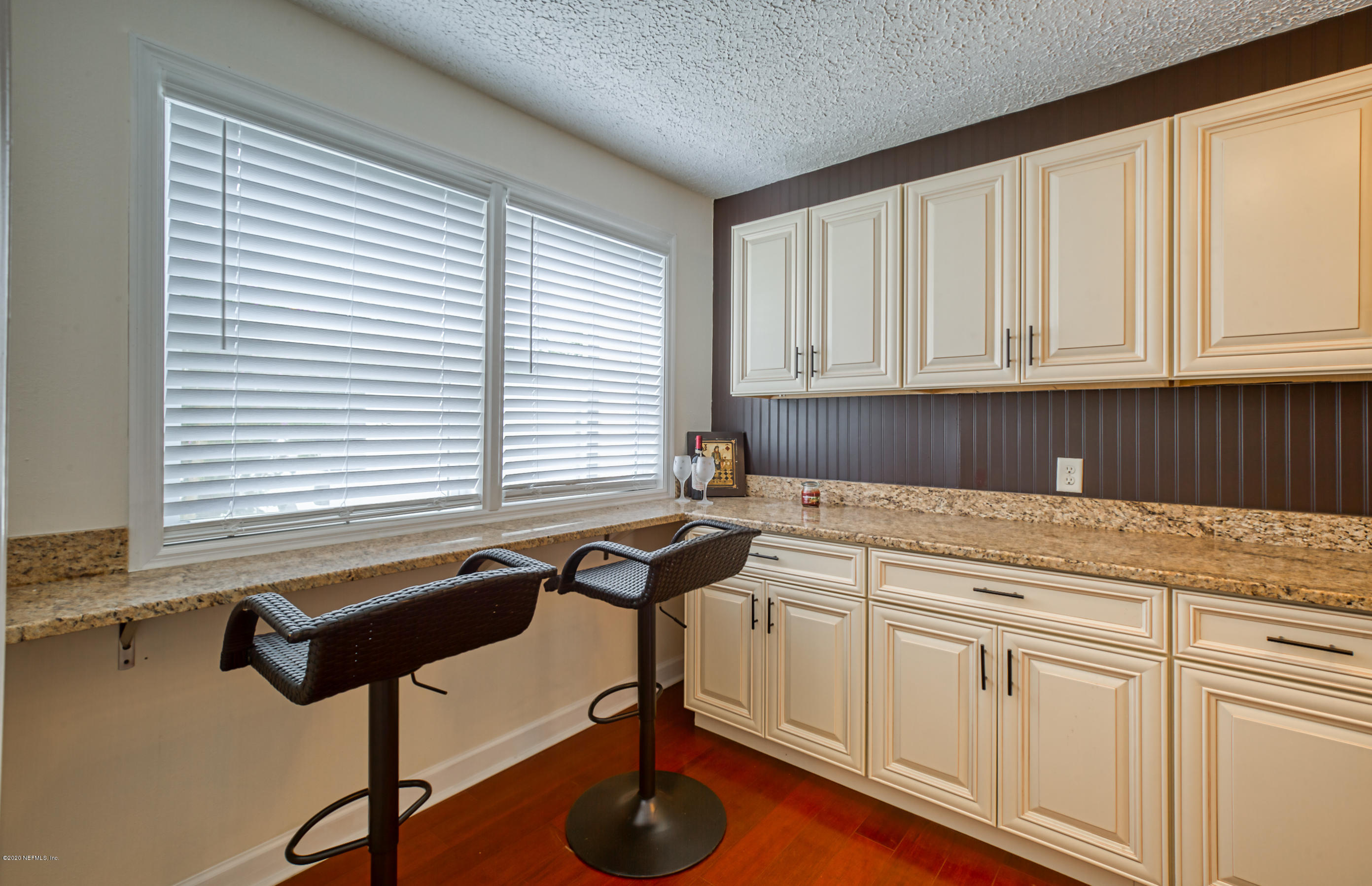 4615 Birkenhead Road Jacksonville, FL 32210 - Photo 10 of 45 a kitchen with a sink cabinets and window