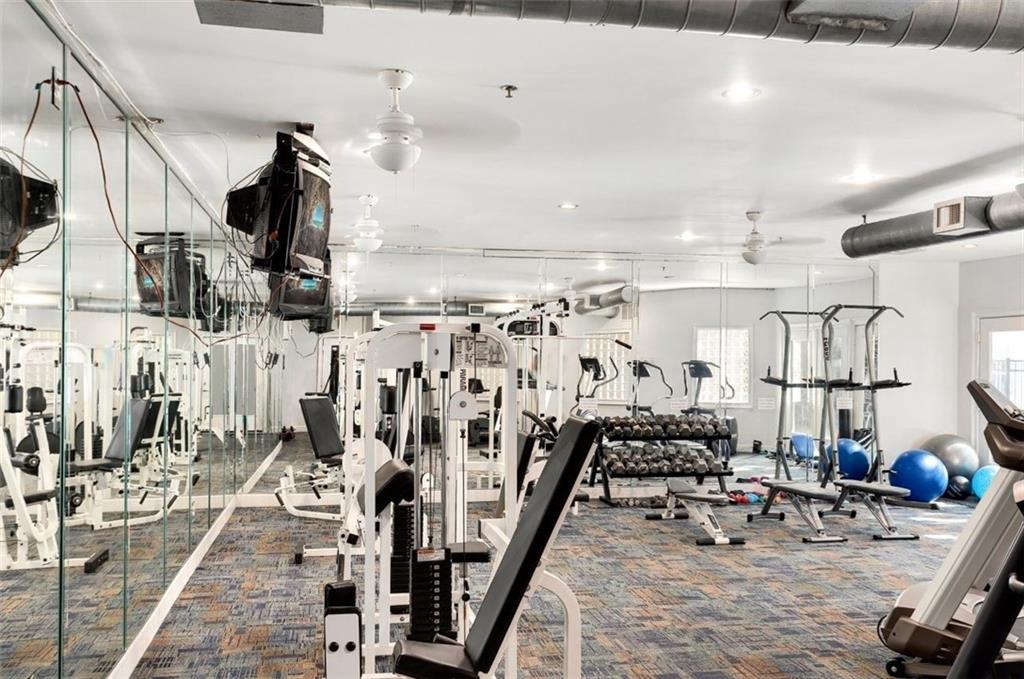 821 Ralph McGill Boulevard Northeast, Unit 3404 Atlanta, GA 30306 - Photo 16 of 18 a view of a room with gym equipment