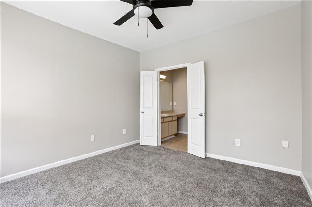 821 Ralph McGill Boulevard Northeast, Unit 3404 Atlanta, GA 30306 - Photo 10 of 18 an empty room with a bathroom