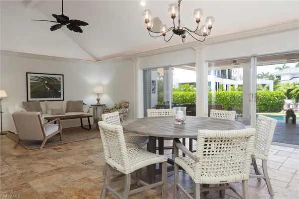 a kitchen with stainless steel appliances a refrigerator and a stove