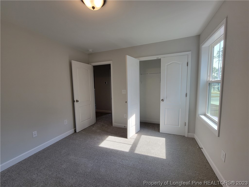 187 Timber Skip Drive Spring Lake, NC 28390 - Photo 17 of 20 a view of entryway with stairs