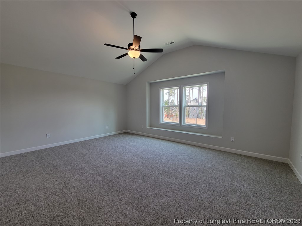 187 Timber Skip Drive Spring Lake, NC 28390 - Photo 8 of 20 a view of an empty room with a window