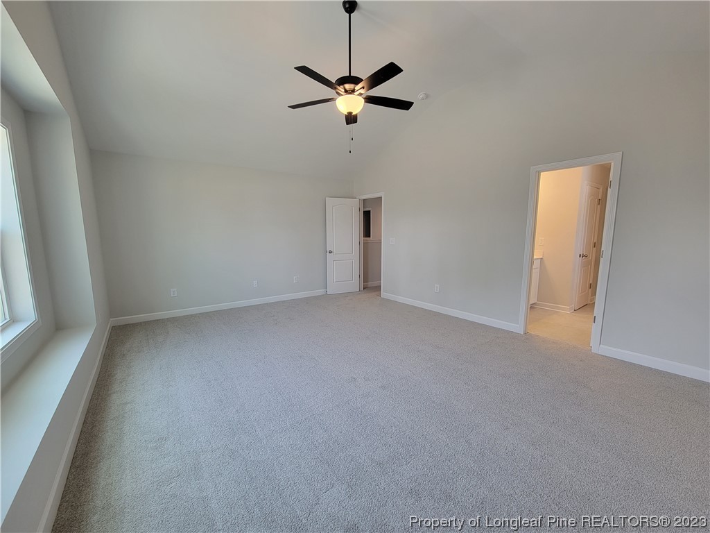 187 Timber Skip Drive Spring Lake, NC 28390 - Photo 9 of 20 a view of room with a ceiling fan