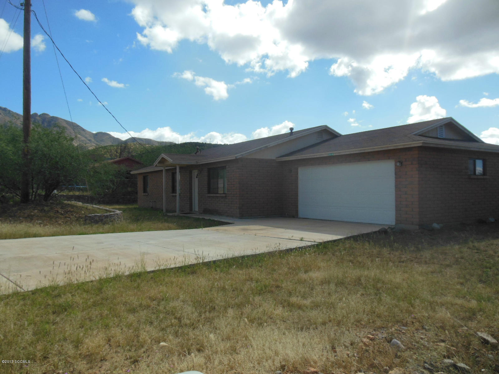 284 Círculo Silva Rio Rico, AZ 85648 - Photo 18 of 19 a view of a house with a backyard