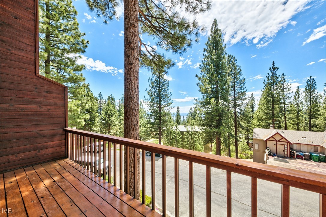 609 Lariat Circle, Unit 2 Incline Village, NV 89451 - Photo 11 of 24 a view of a wooden balcony and trees