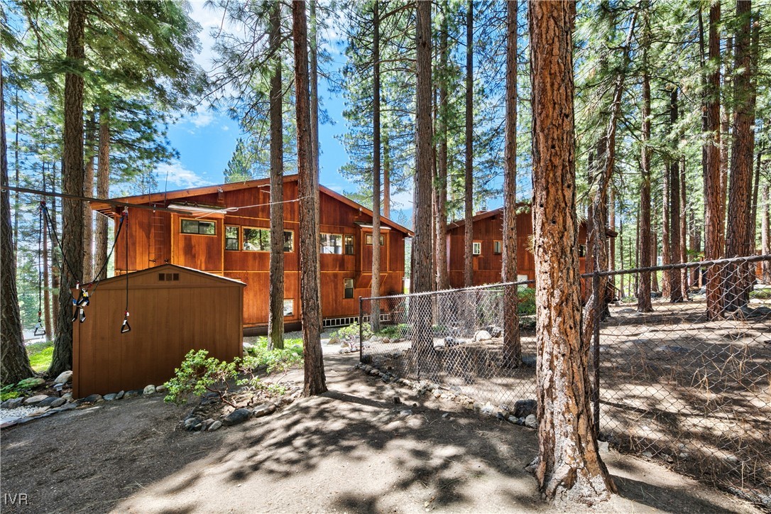 609 Lariat Circle, Unit 2 Incline Village, NV 89451 - Photo 23 of 24 a view of a street with potted plants and large trees