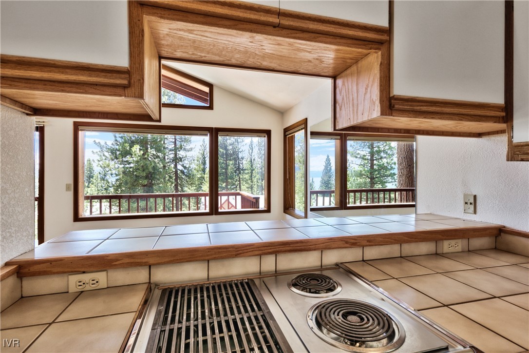 609 Lariat Circle, Unit 2 Incline Village, NV 89451 - Photo 9 of 24 a view of a kitchen with a sink and cabinets