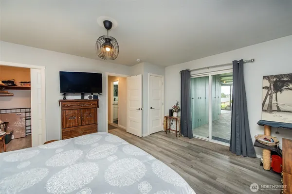 a view of a kitchen from the hallway