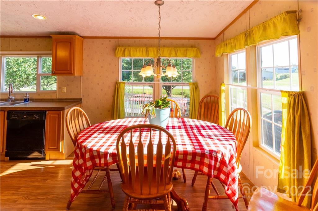 48 Lynn Estate Road Hendersonville, NC 28792 - Photo 11 of 23 a dining room with furniture and window