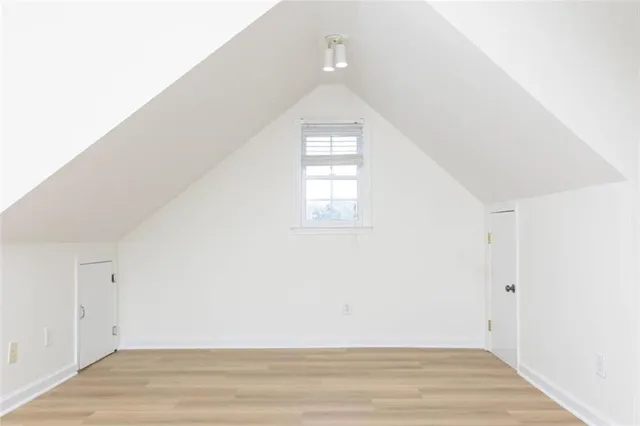 a view of a room that has a window in it