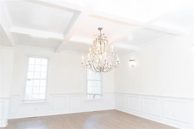 a view of empty room with a fireplace