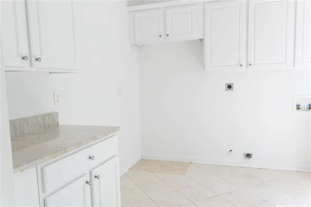 a view of swimming pool with a patio