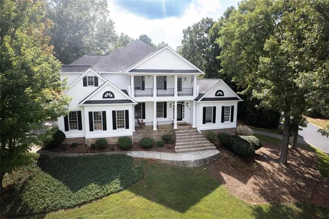an aerial view of a house with mountain view