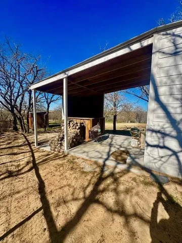 a view of back yard on the house