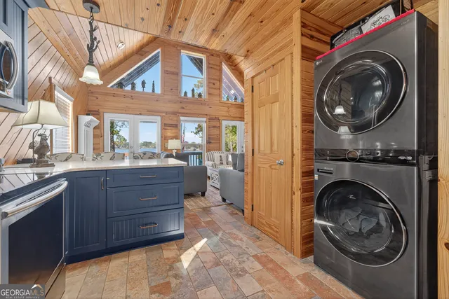 a view of a kitchen and utility room