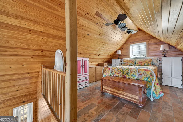 a front view of a house with parking space