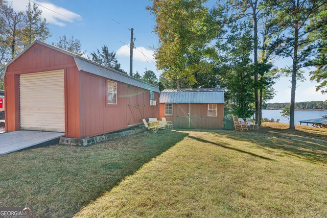 a swimming pool view with a lake view