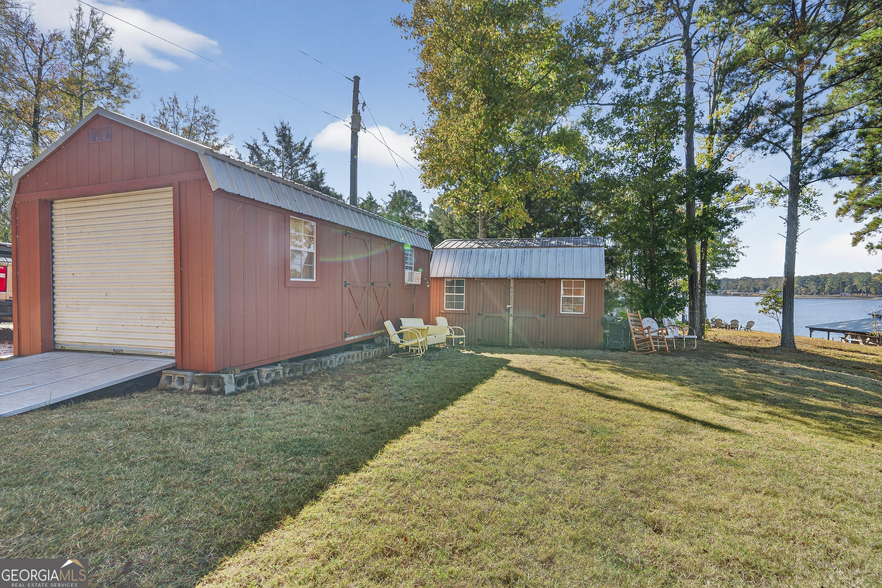 955 Barbara Point Road Sparta, GA 31087 - Photo 32 of 54 a view of backyard of house