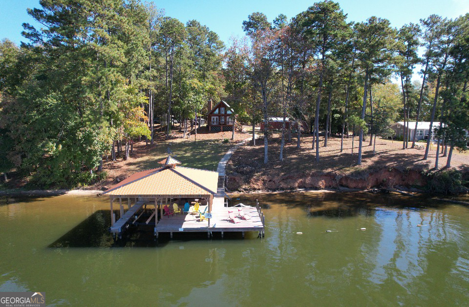 955 Barbara Point Road Sparta, GA 31087 - Photo 34 of 54 a swimming pool view with a lake view
